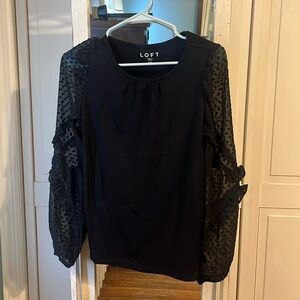 Black blouse with sheer ruffled arms